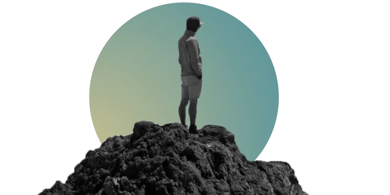 A person stands on a mountain reflecting on the topic of quantum computing. He is looking for an opportunity to start working with quantum applications today.